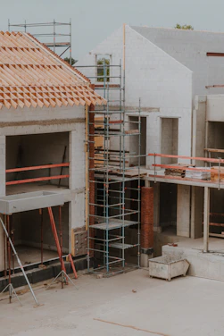 a building under construction with scaffolding and scaffolding around it