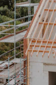 a building under construction with scaffolding around it