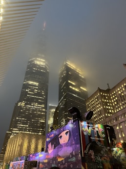 An atmospheric digital artwork depicting ancient giants blending into a contemporary cityscape at night.