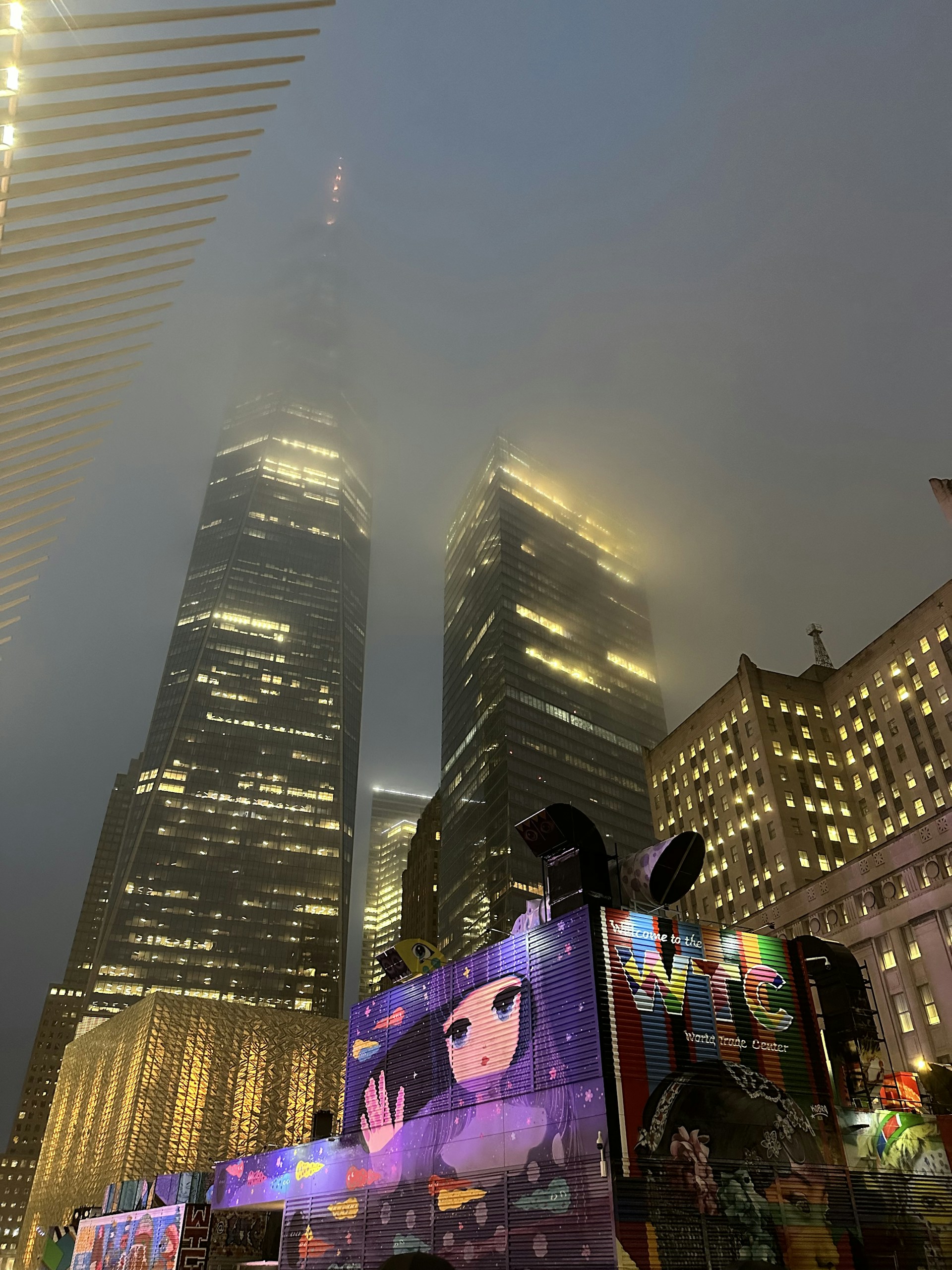 The NYC skyline at night framed by street art murals blending grit and futuristic vibes, reflecting the energy of the techno scene.