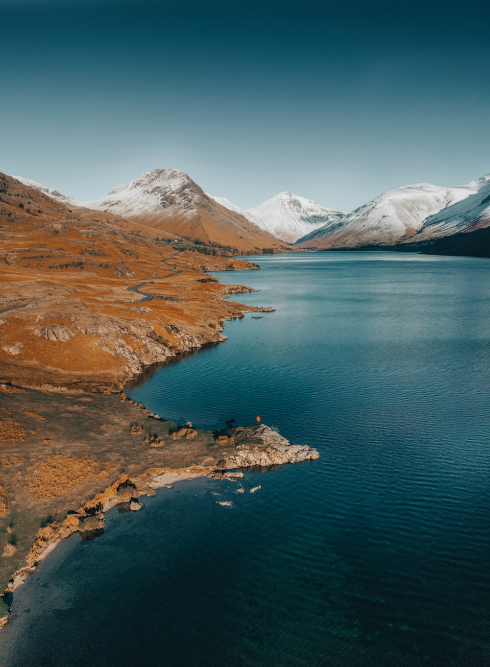 a large body of water surrounded by mountains