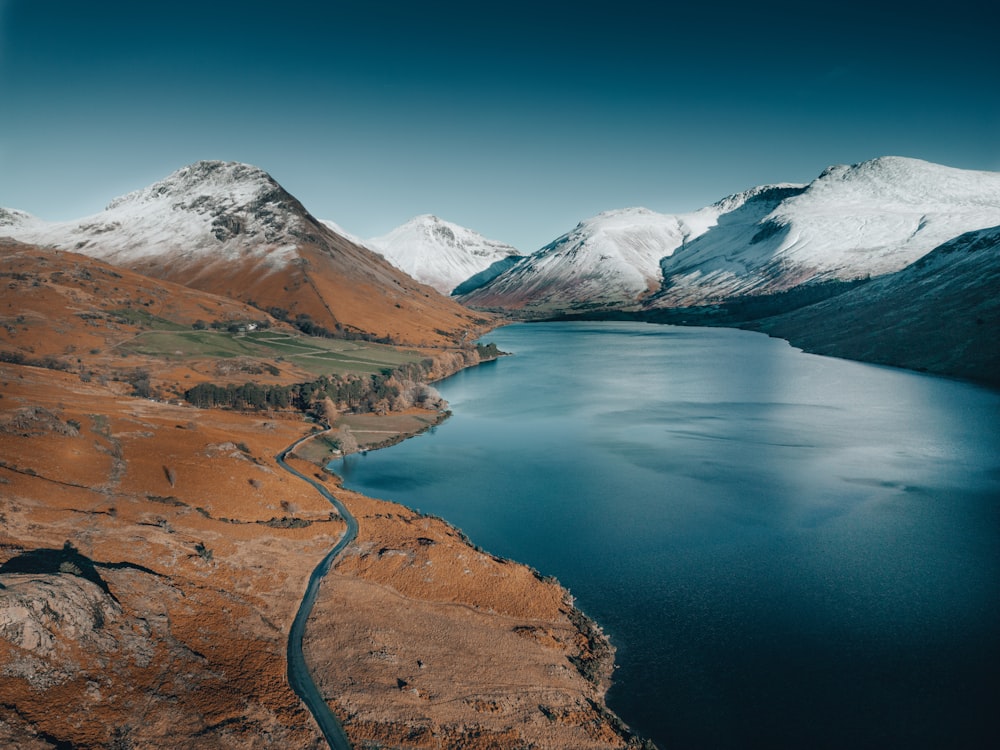 a large body of water surrounded by mountains