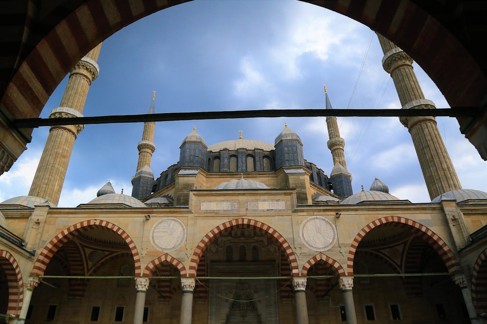 a view of a building through an archway