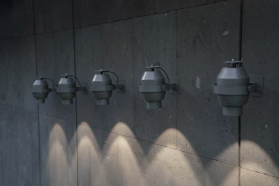 Industrial warehouse lighting fixtures providing bright, efficient illumination.