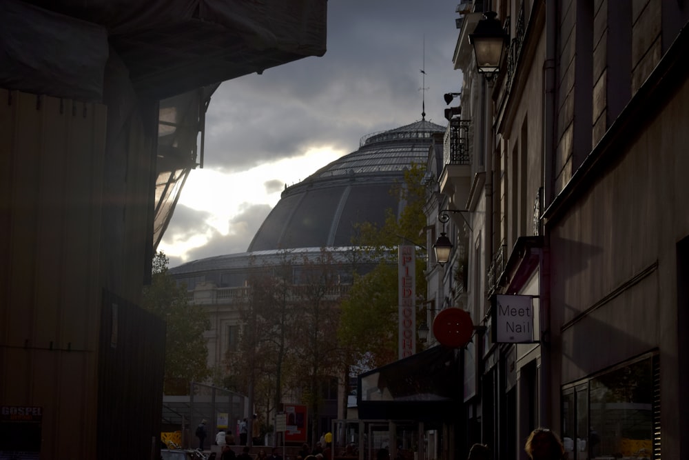 a city street with a building in the background