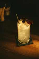 Creative cold beverages served in elegant glassware with natural light.