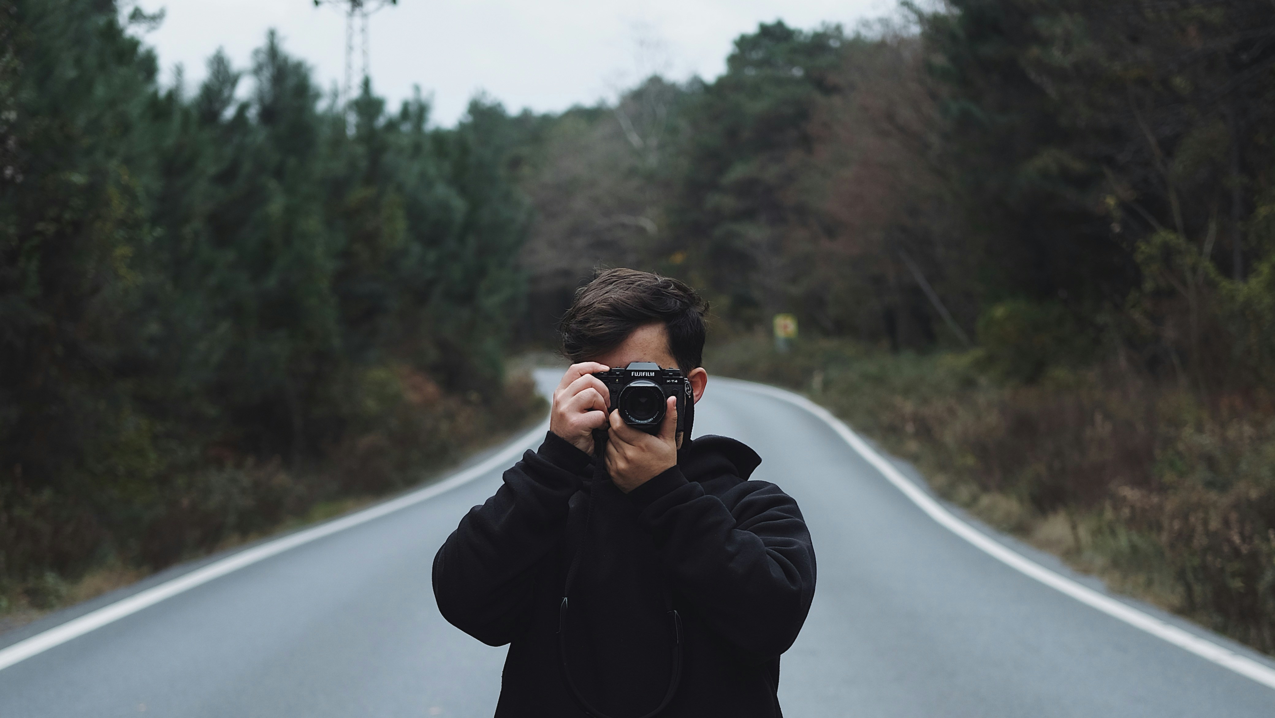 a man taking a picture of himself with a camera