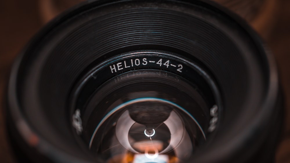 a close up of a camera lens with a reflection