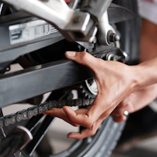 a close up of a person holding a bike tire