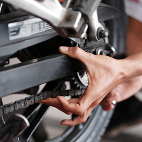 a close up of a person holding a bike tire