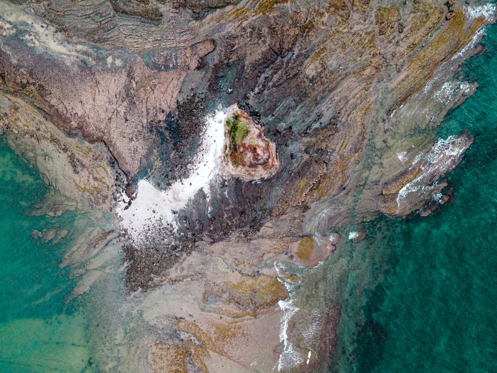 a bird's eye view of a rocky beach