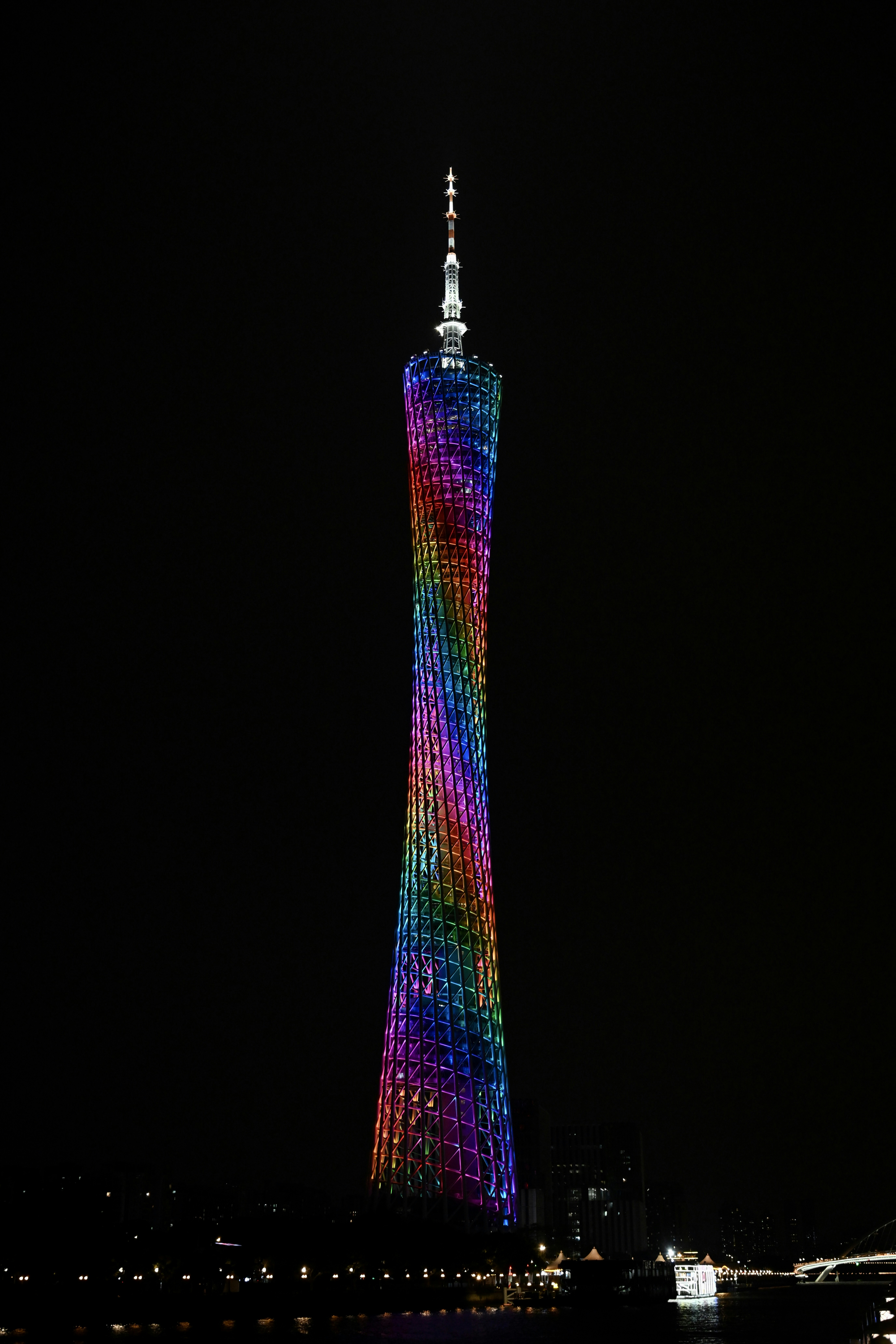 A very tall building with a very colorful design on it's side