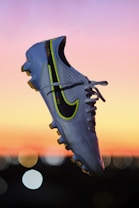 a pair of shoes that are in the air