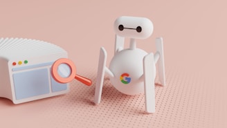 a small white robot next to a small white radio