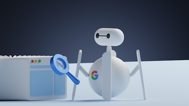 a white robot holding a magnifying glass next to a white box