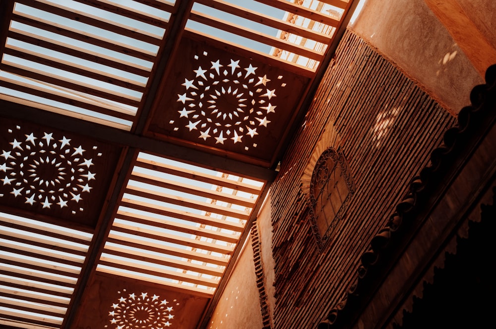 the ceiling of a building has intricate designs on it