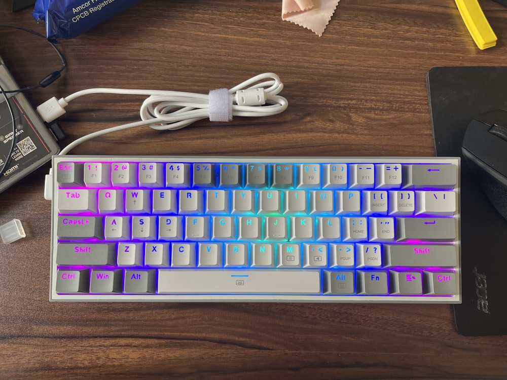 a keyboard and mouse sitting on a desk