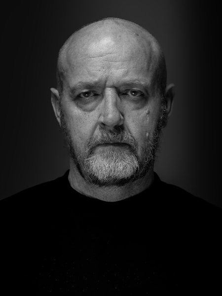 Bald man portrait — hero placeholder