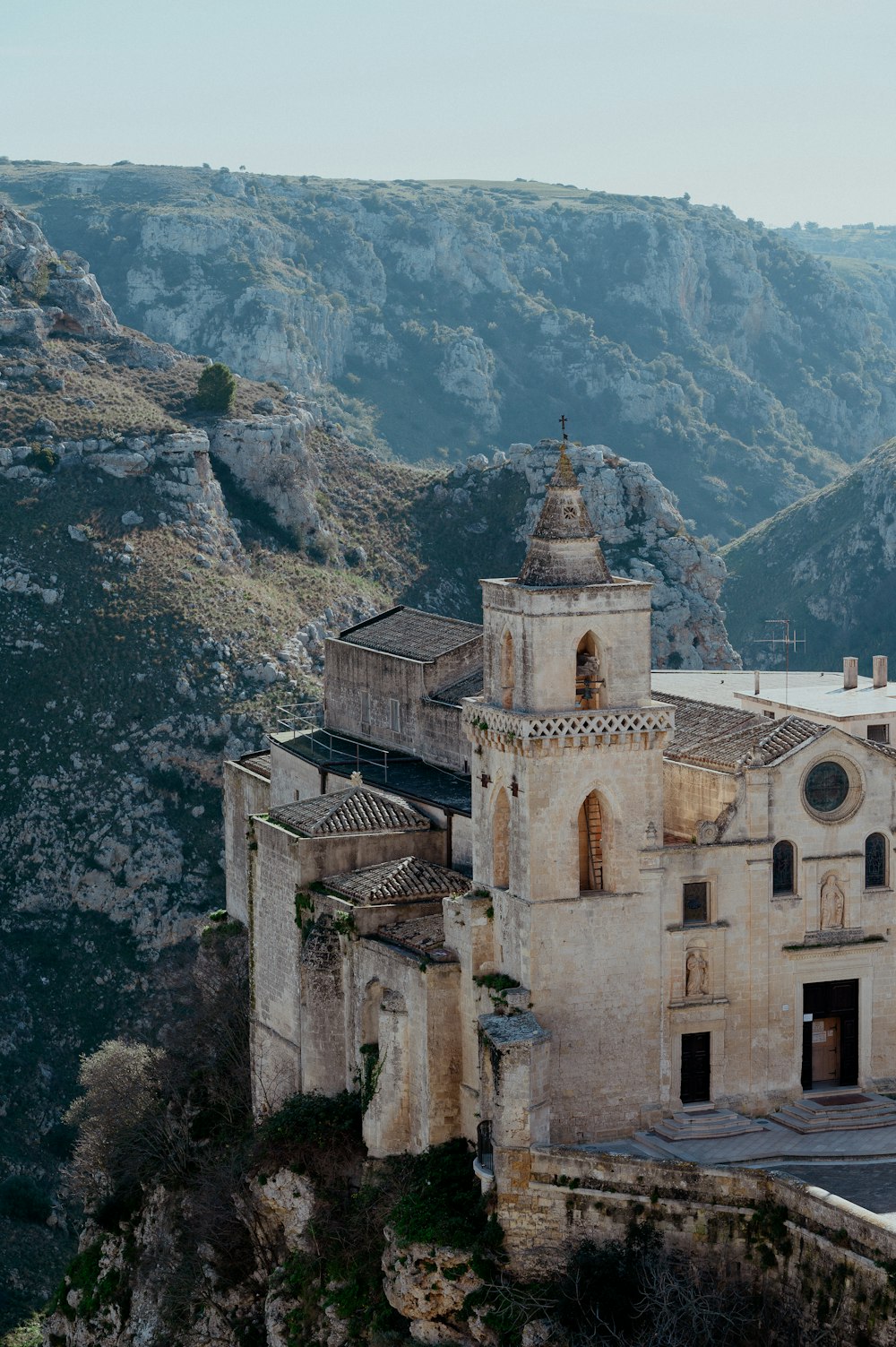 an old church in the middle of a mountain