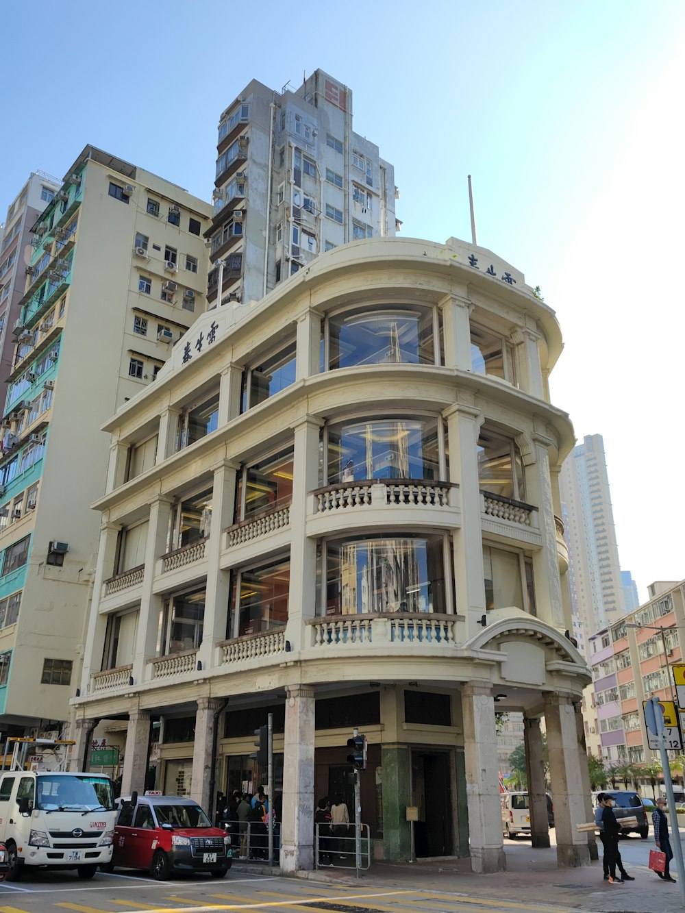 a tall building with balconies and balconies on the top of it