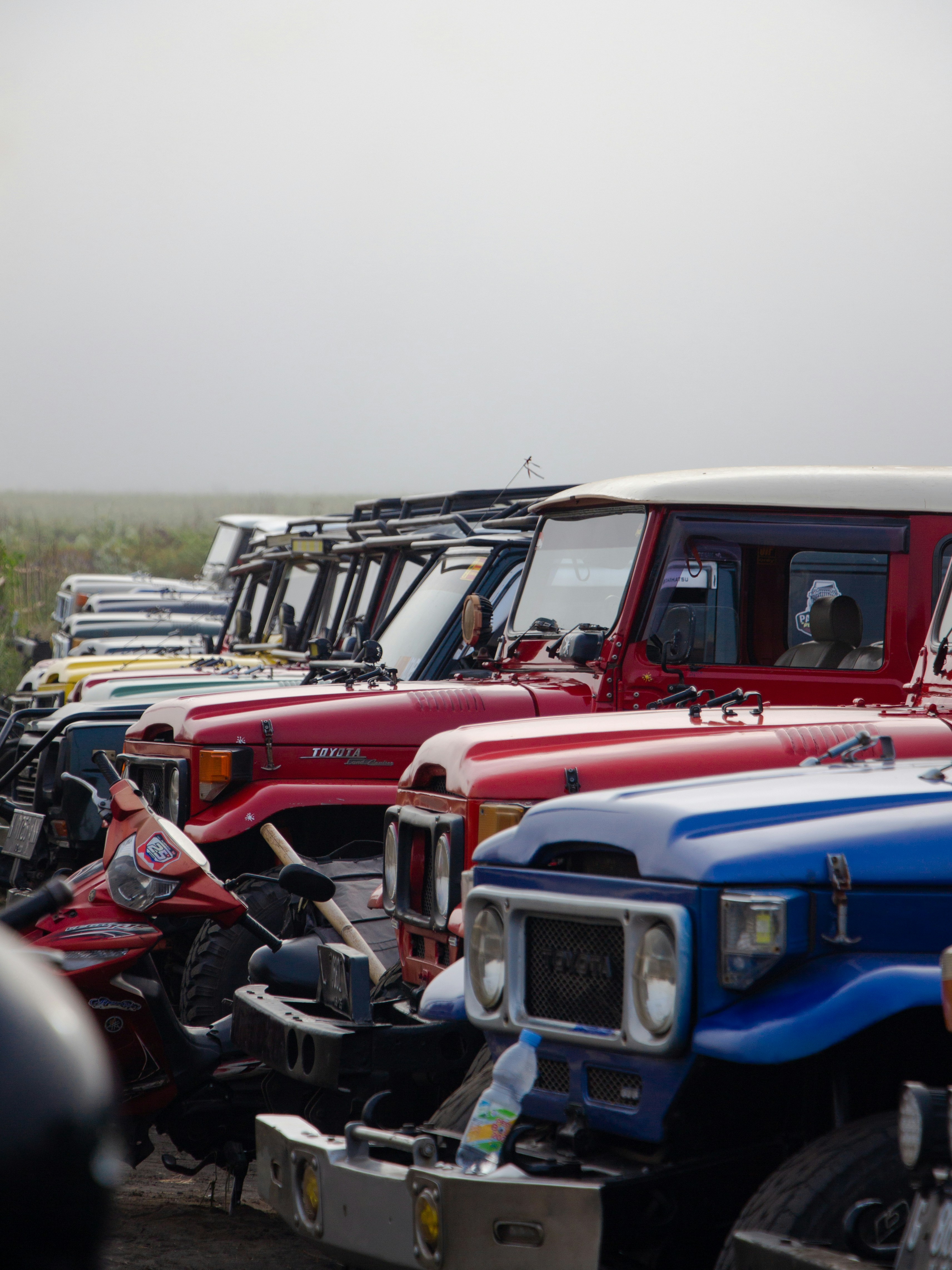 a group of trucks parked next to each other