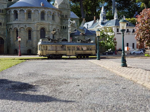Close-up of tram-train model showcasing technical details and station stops.