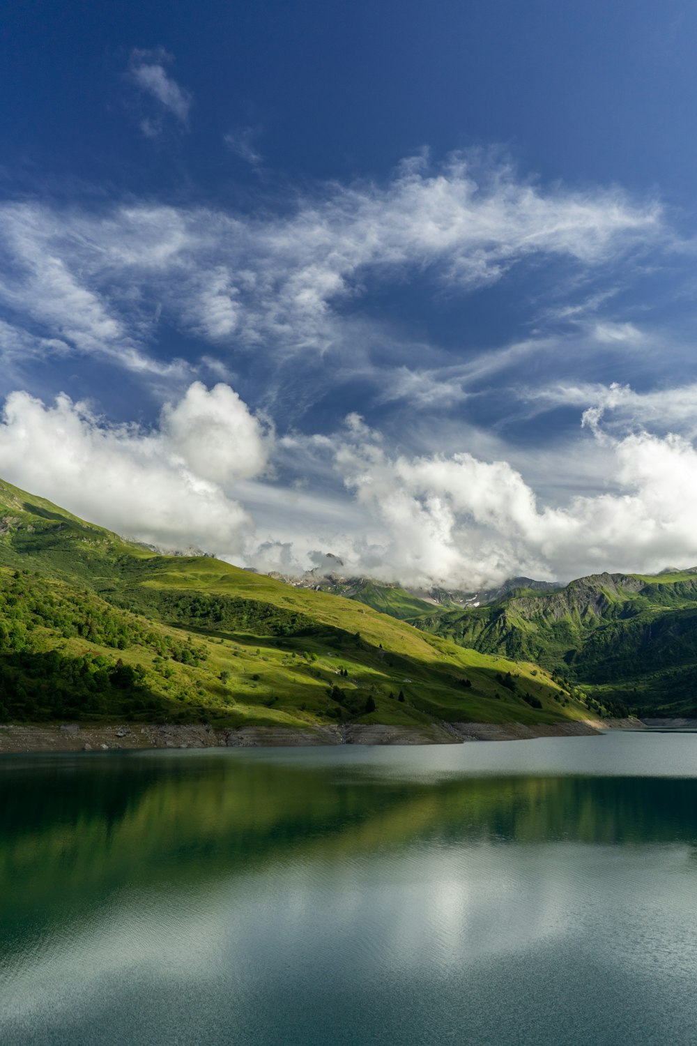 a large body of water surrounded by mountains