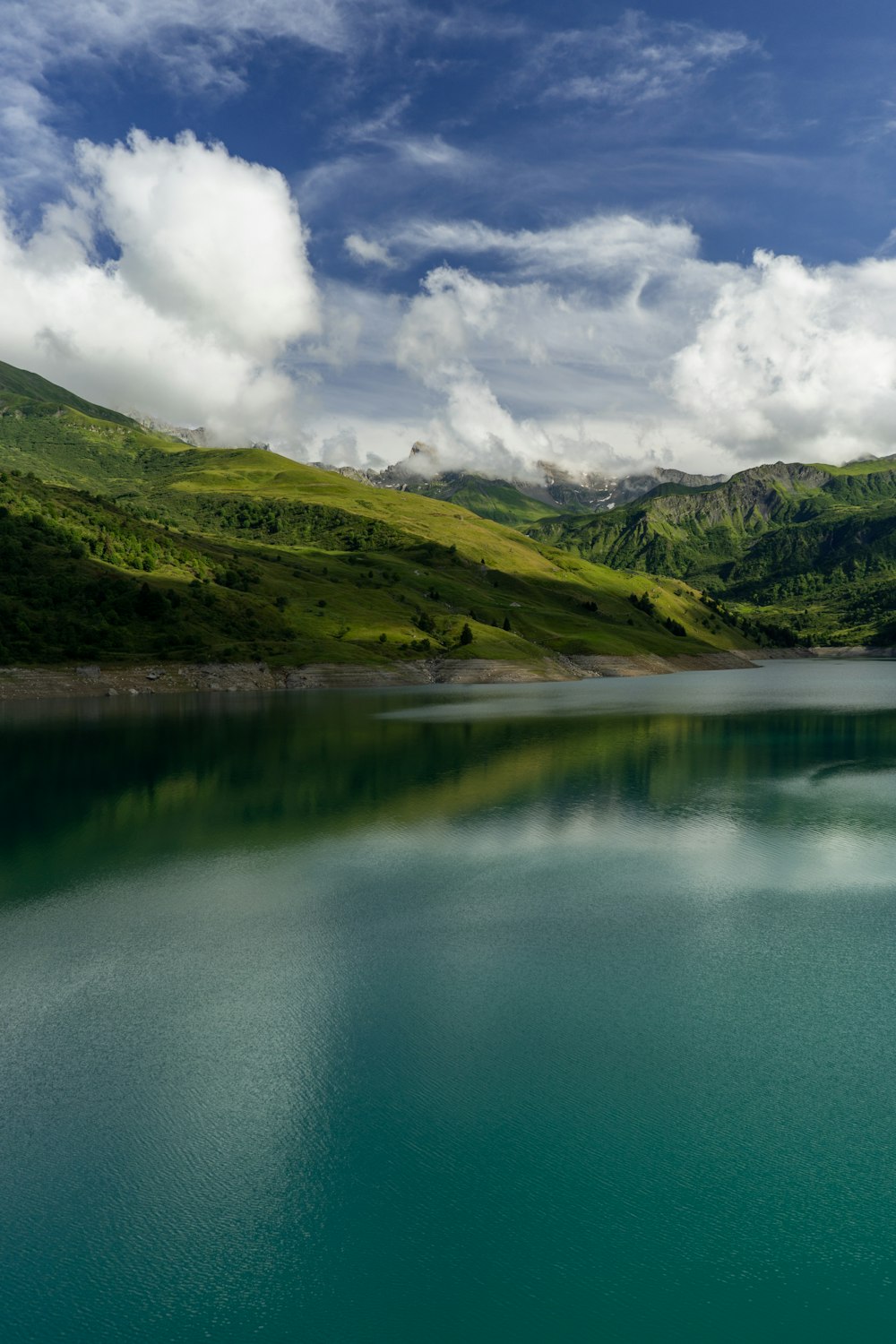 a large body of water surrounded by mountains