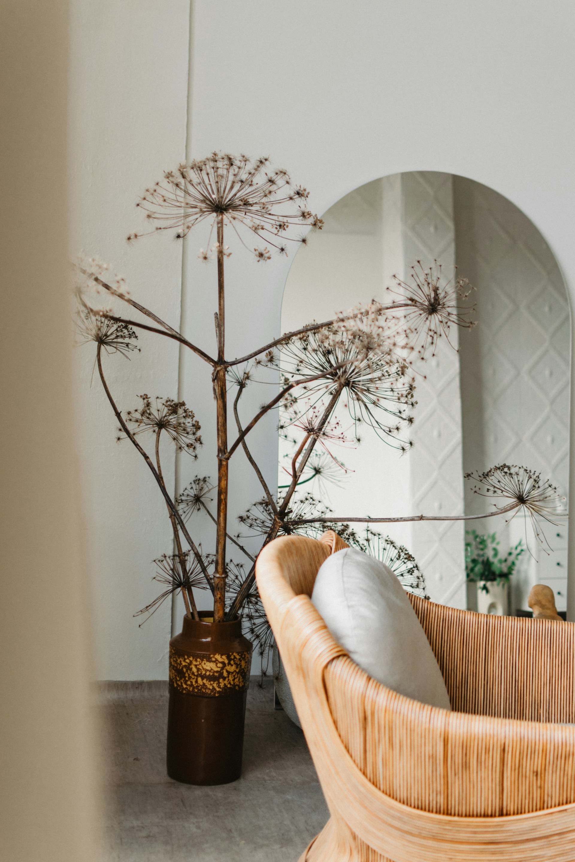 a mirror and a chair in a room