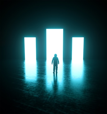 a person standing in front of a doorway in a dark room