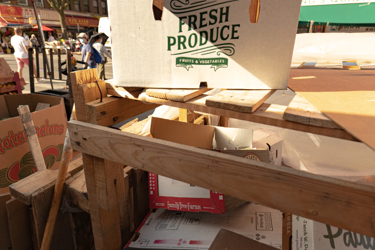Boxes of fresh fruit and vegetables stacked ready for distribution