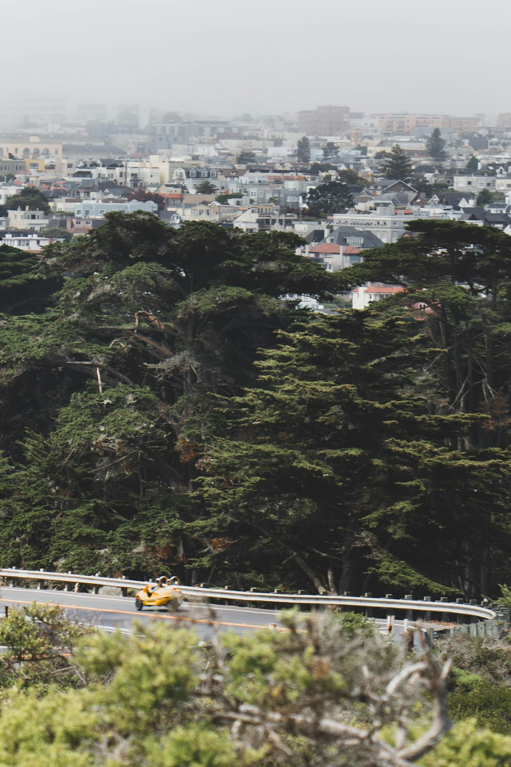 a view of a city from a hill