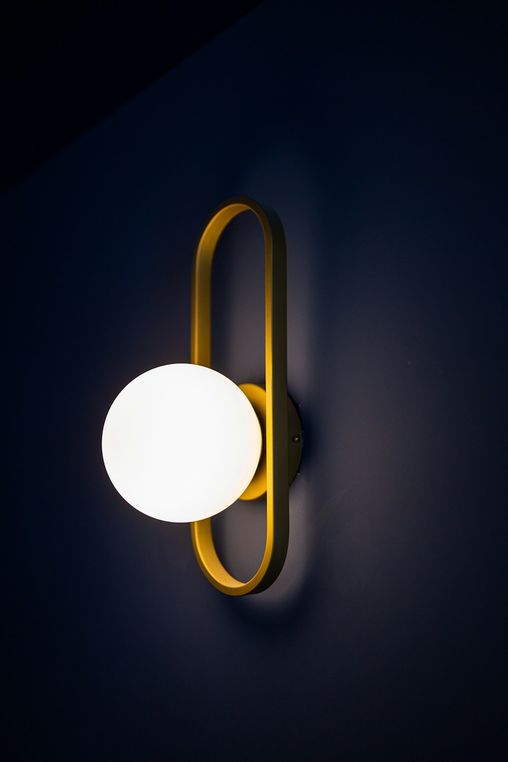 a wall light that is on the side of a wall