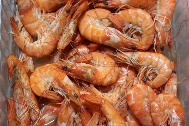 A close-up of assorted seafood products including shrimp.