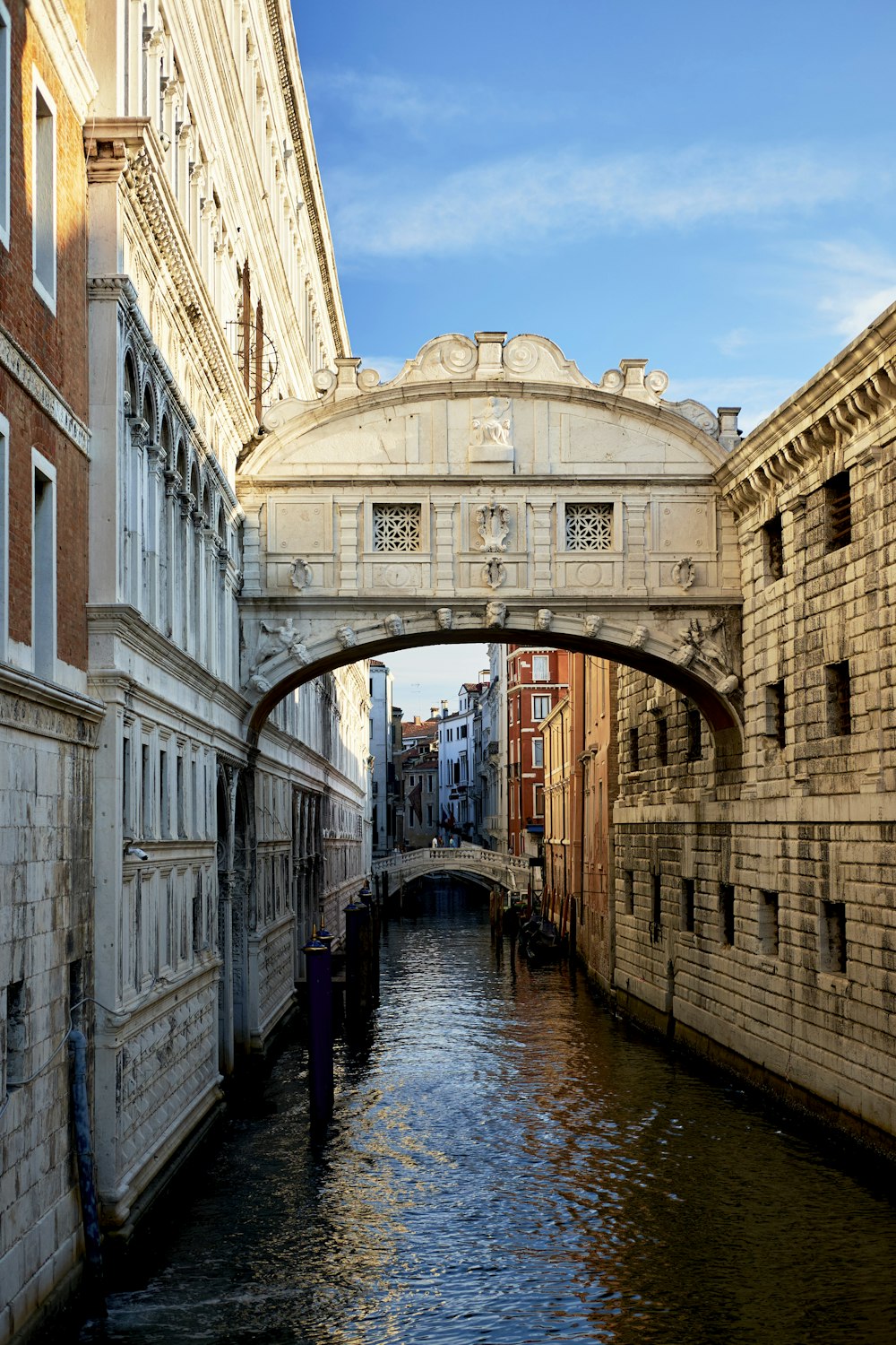 a bridge over a river in a city