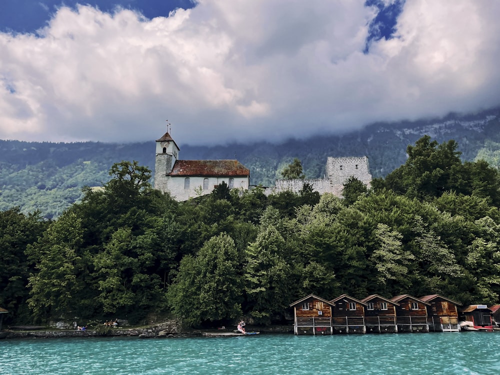 a church on a hill above a body of water