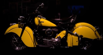 A classic motorcycle gleaming in the sun, with a vintage design and chrome details.