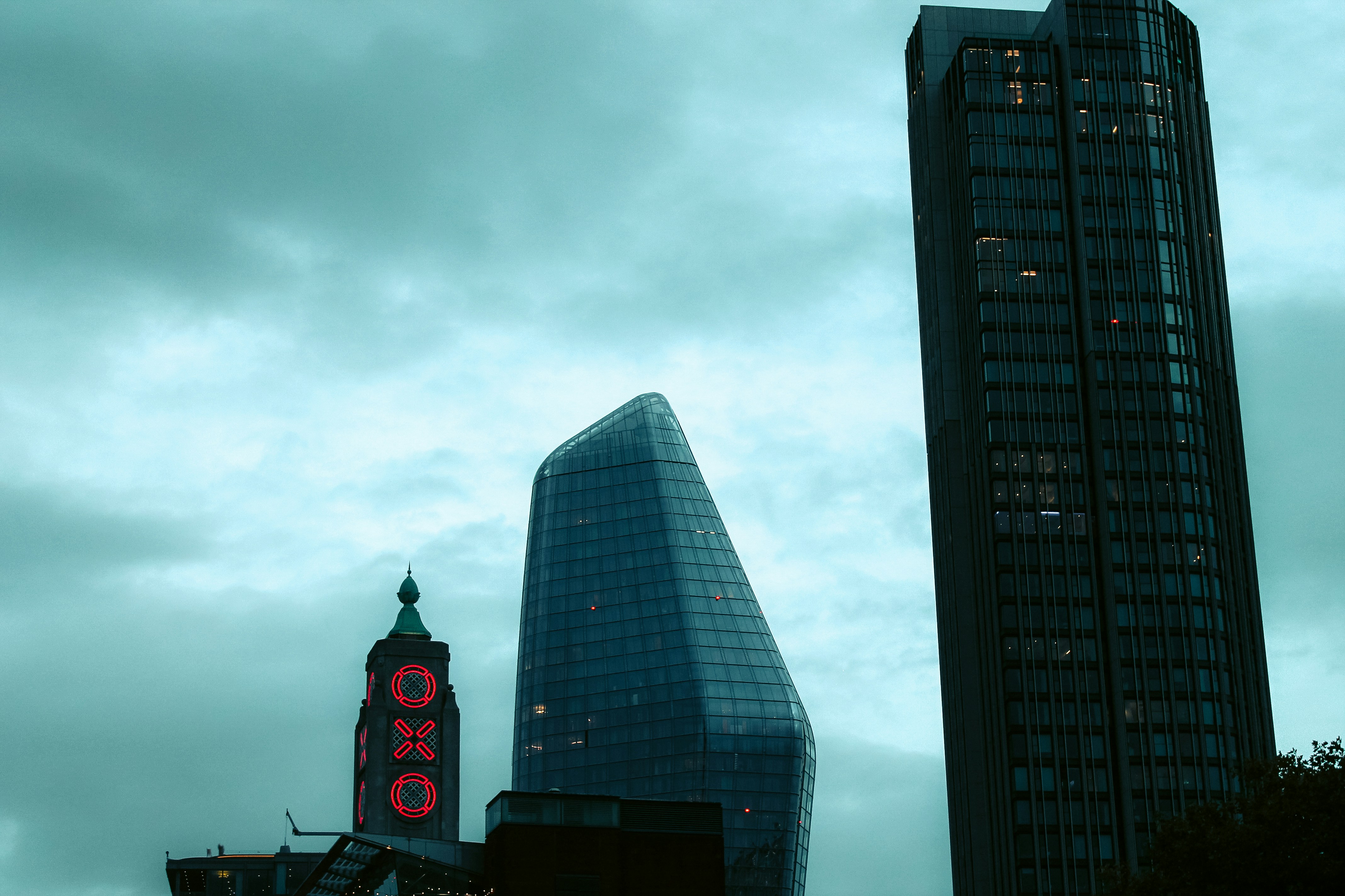 a very tall building next to a very tall building