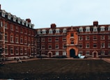a large brick building with a clock tower