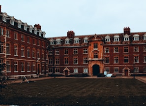 a large brick building with a clock tower