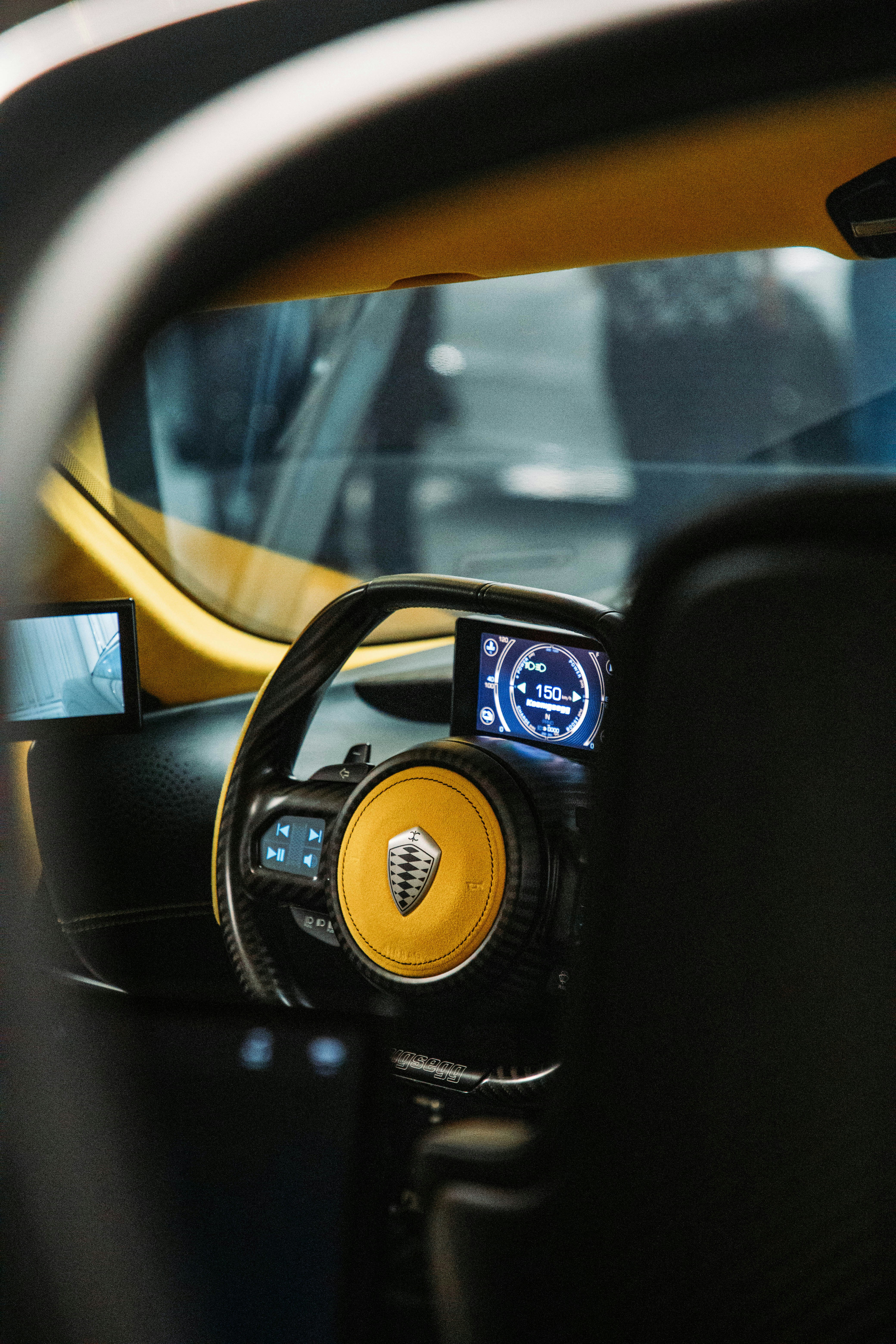 woman wearing yellow long-sleeved dress under white clouds and blue sky during daytime