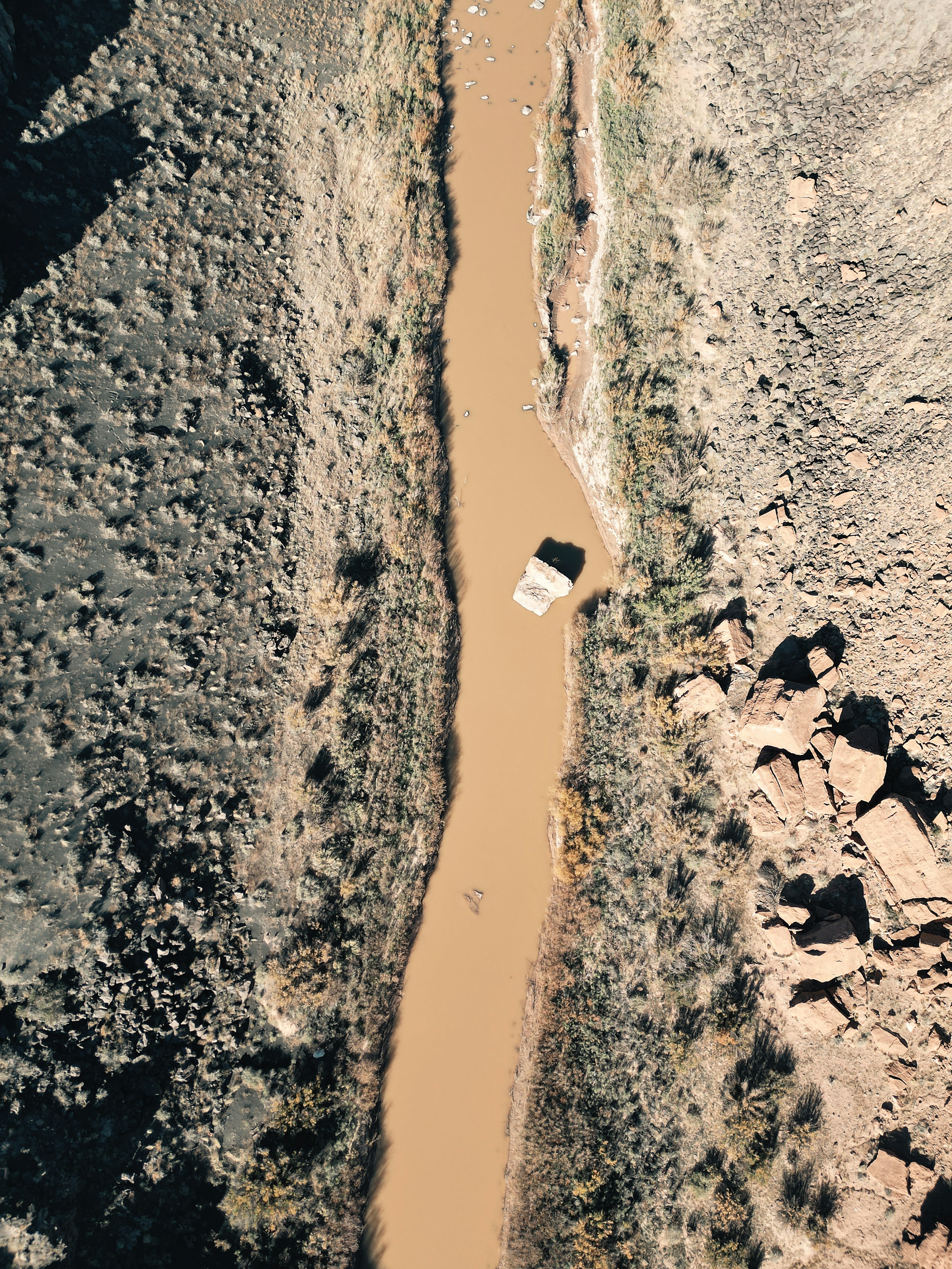 An aerial view of a river in the desert photo – Free River Image on ...