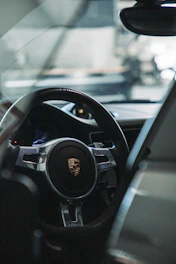 Close-up of a price tag on a car dashboard highlighting affordable pricing.