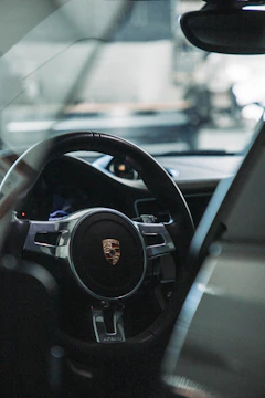 Close-up of a price tag on a car dashboard highlighting affordable pricing.