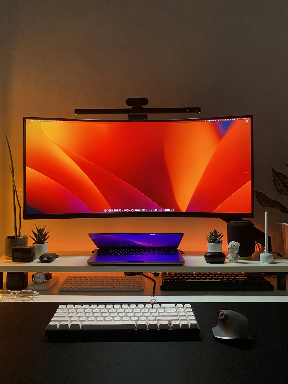 a computer monitor sitting on top of a desk