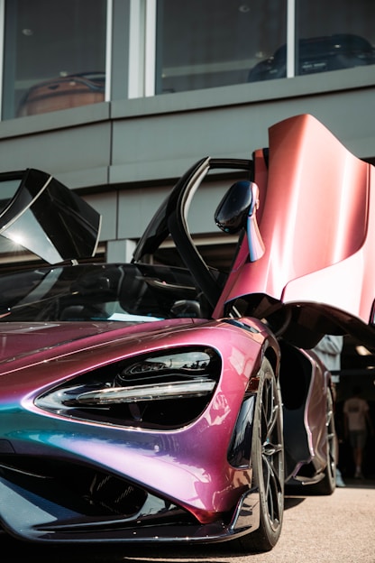 A vibrant Miami Vice themed sports car.