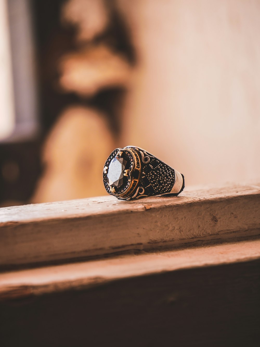 a close up of a ring on a table