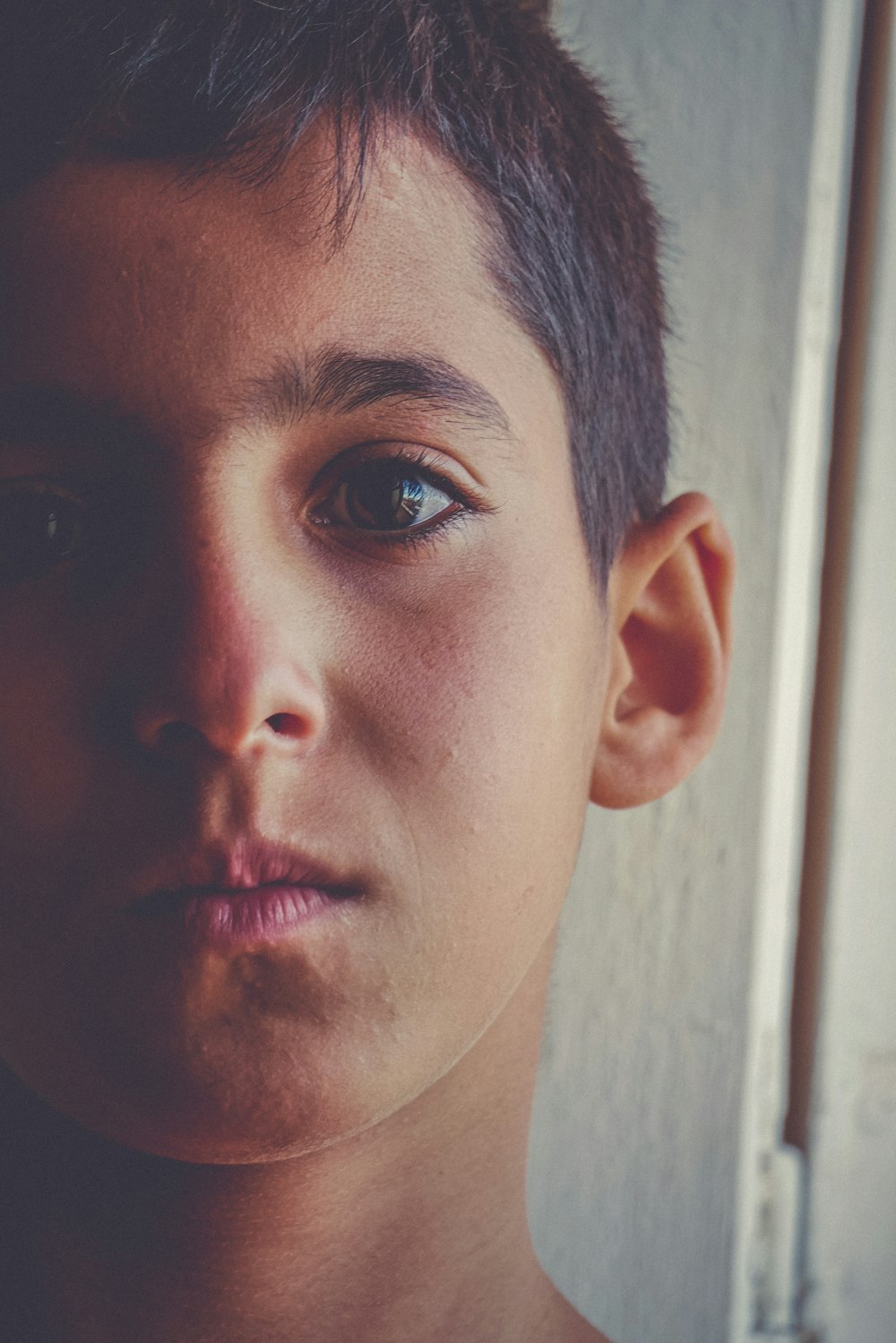 a close up of a person with a tie on