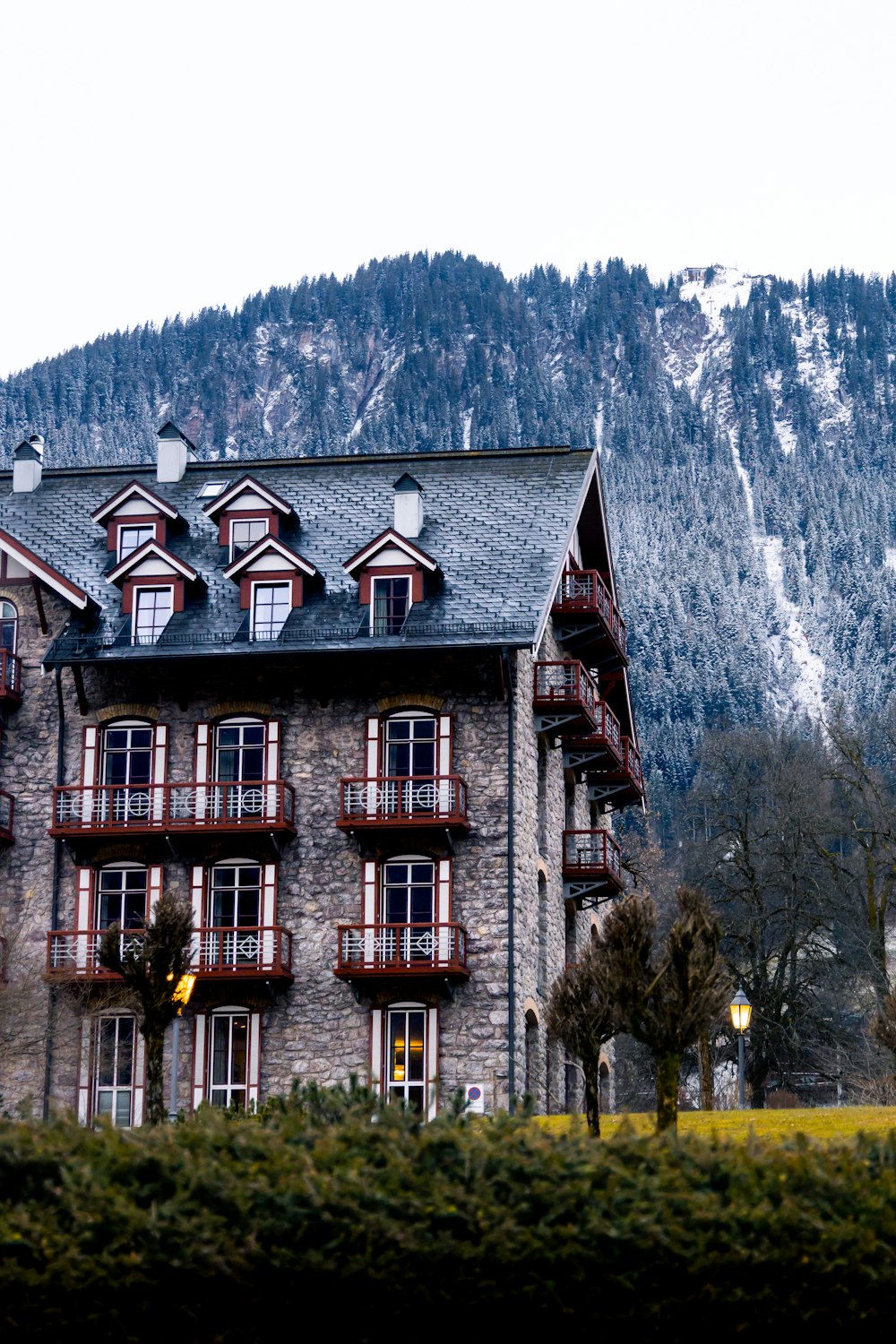 a building with a mountain in the background