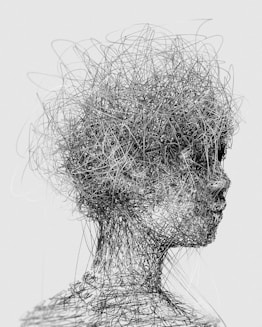 a black and white photo of a woman's head